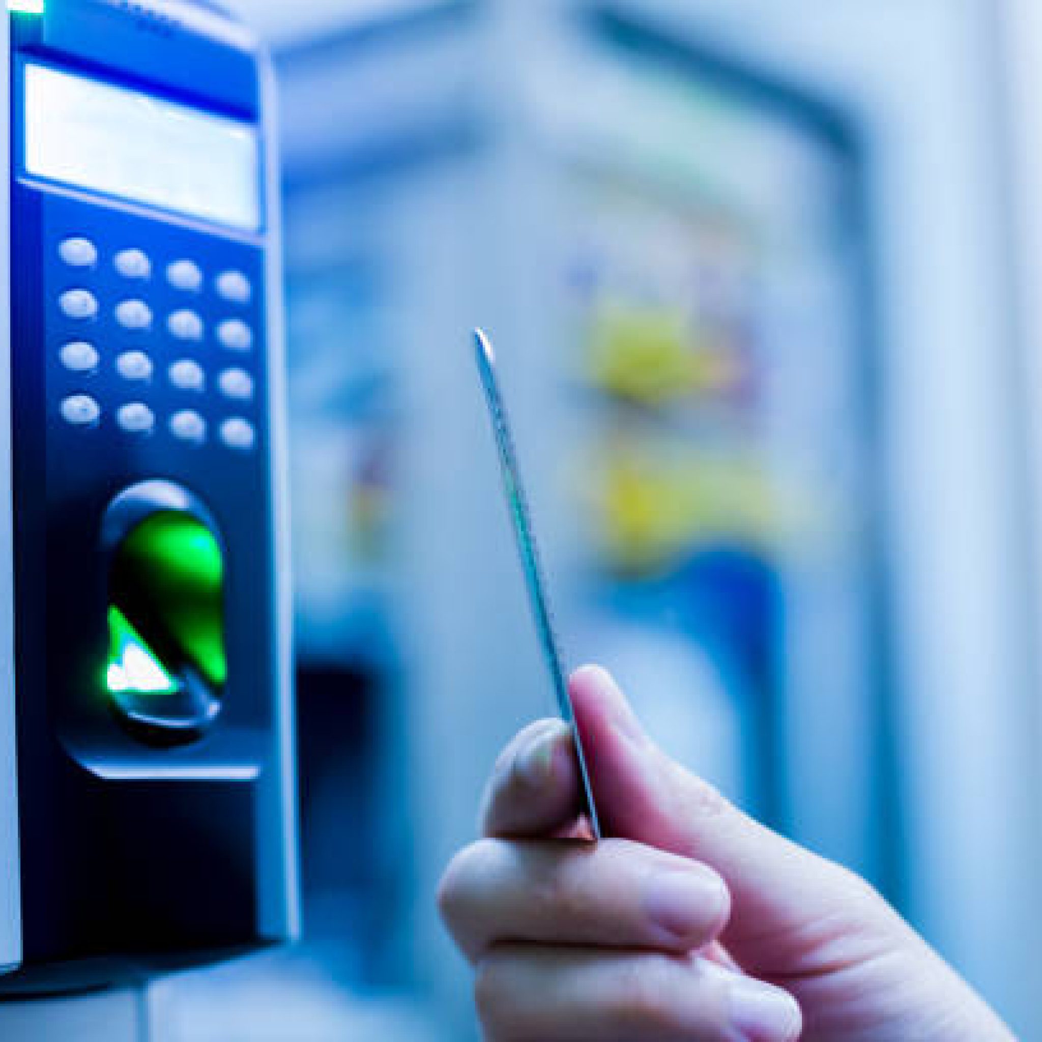 Door access control. Staff holding a key card to lock and unlock door at control room or data center. The concept of data security or data access control.